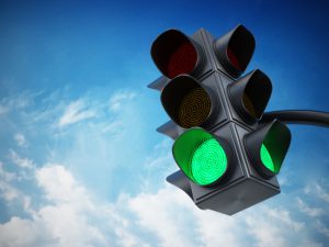 Green traffic light, highlighting the idea of going/starting.