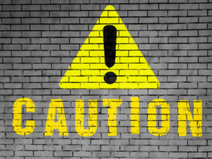 Caution sign painted on