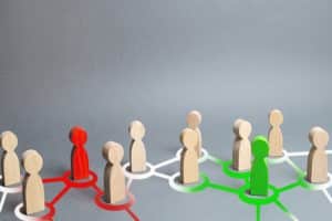 A group of stick figure demonstrating connection via generosity