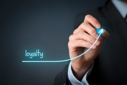 Businessman writing loyalty